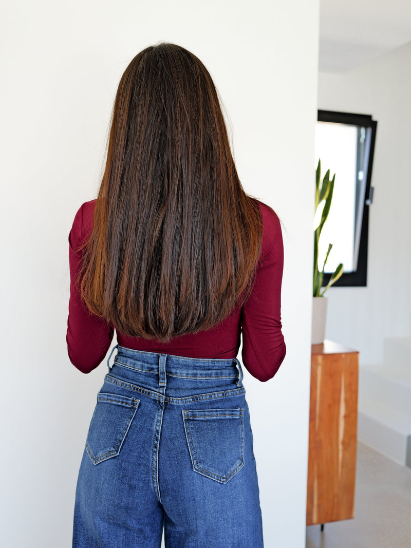 Burgundy bodysuit with sleeves and slits